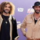 two men standing on the red carpet